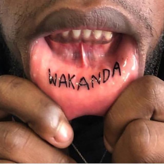 black panther mouth tattoo
