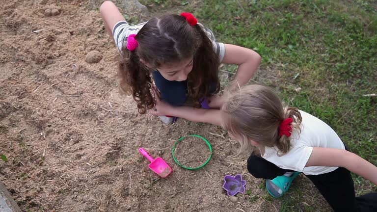 2 kids 1 sandbox