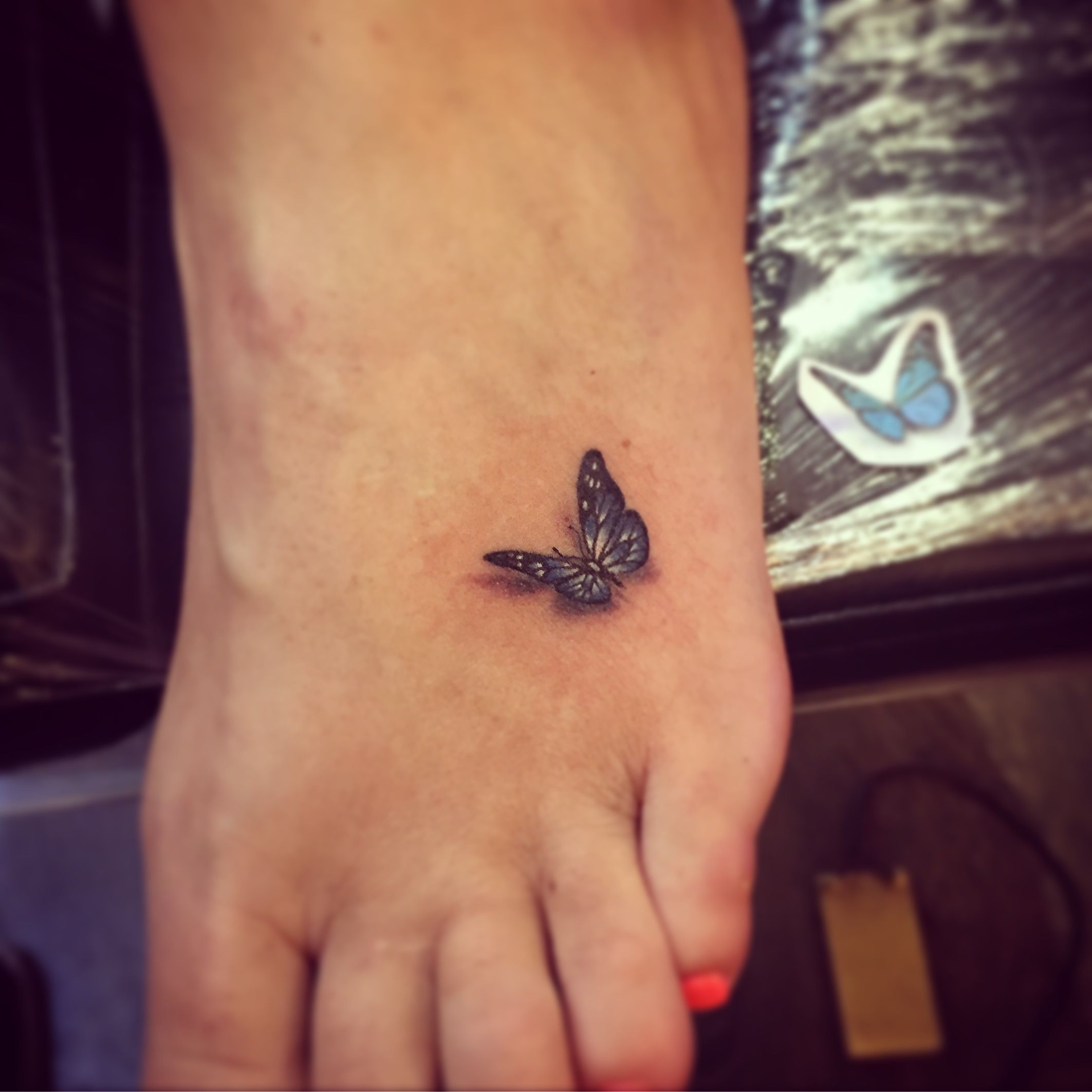 small butterfly tattoos on foot