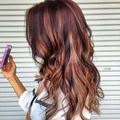 dark red brown hair with caramel highlights