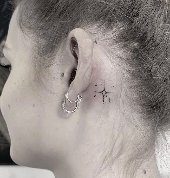 back of earlobe tattoo