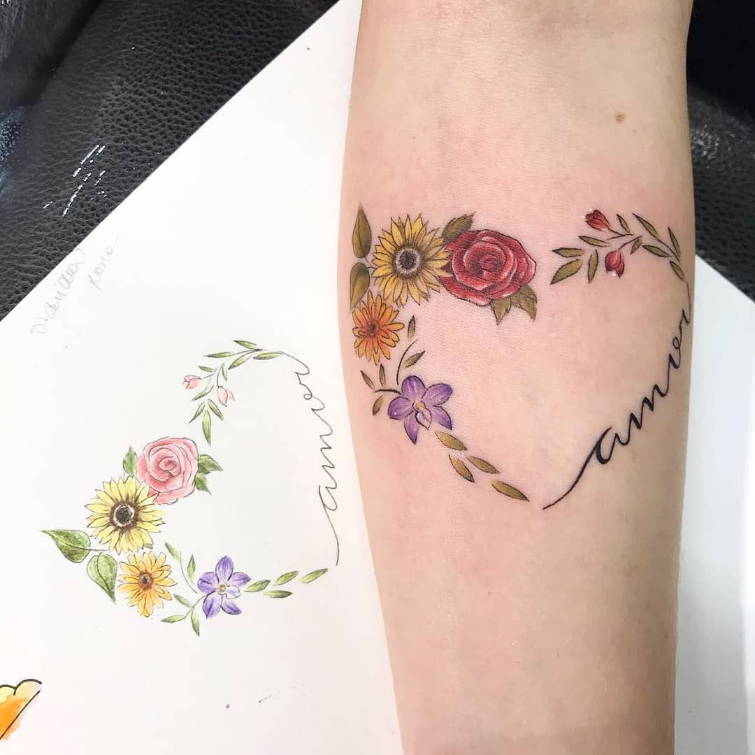 tatuaje corazon con flores