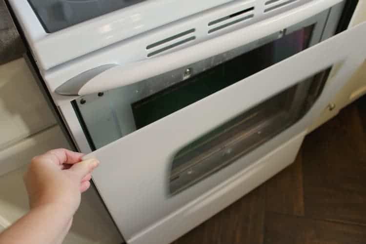 remove oven door maytag