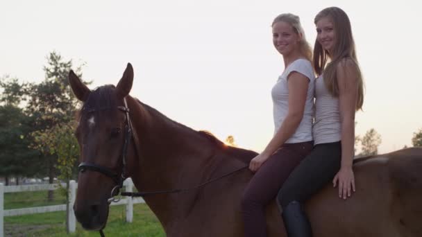 two girls one horse video