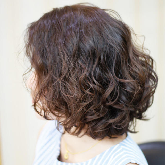 curly hair long bob cut