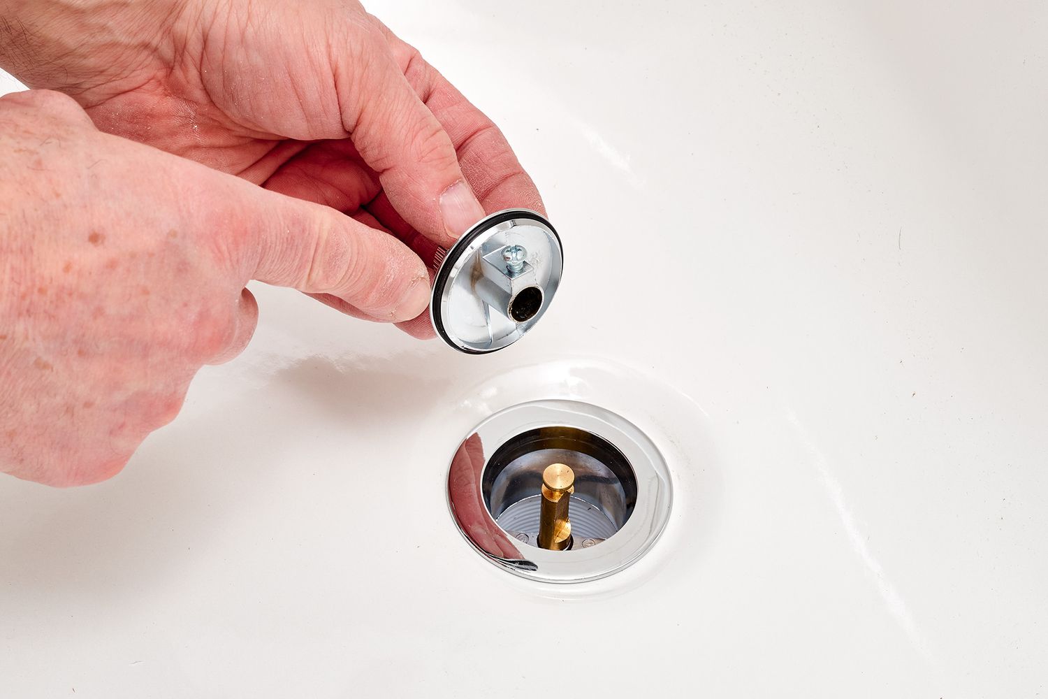 how to remove the tub drain stopper