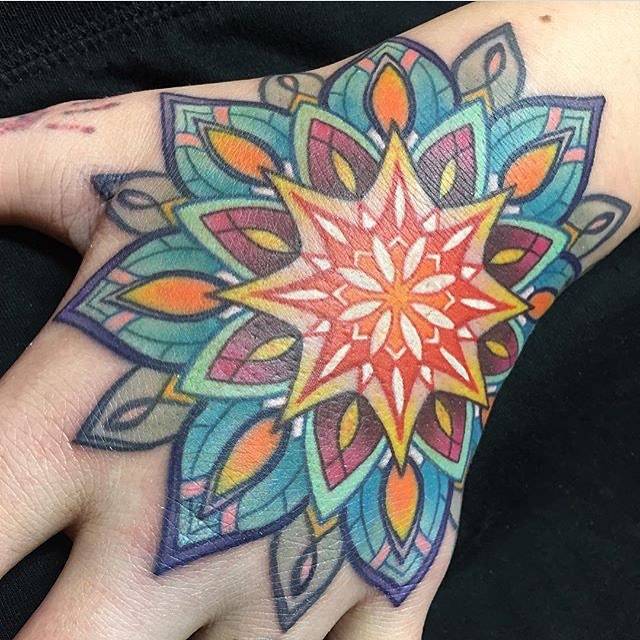 mandala tattoo hand