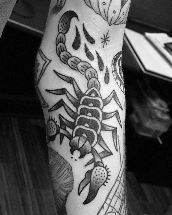 black traditional scorpion tattoo