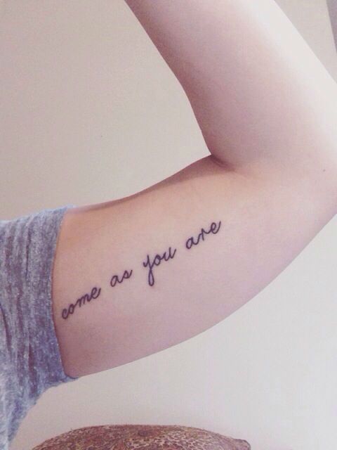 bicep tattoos words