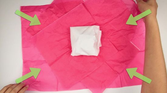 how to put tissue paper in a gift bag