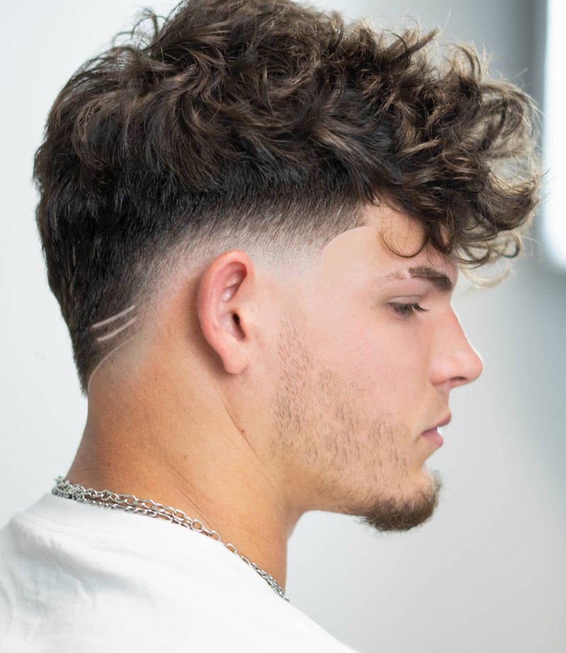 curly top mid fade