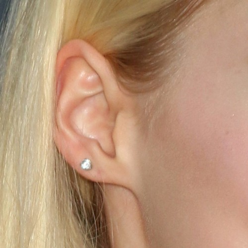 dove cameron ear piercings