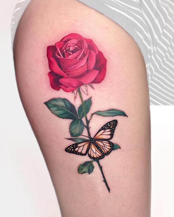 realistic red rose tattoo with stem