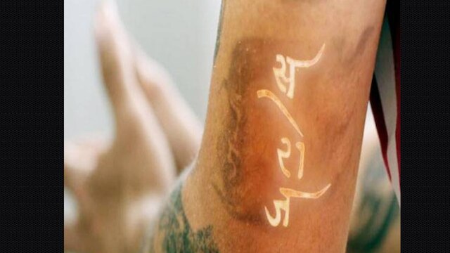tattooed meaning in hindi