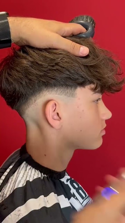 low fade fluffy hair