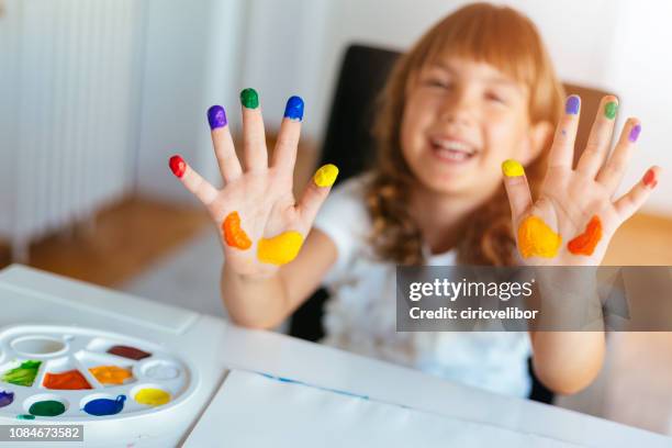 four girls finger painting