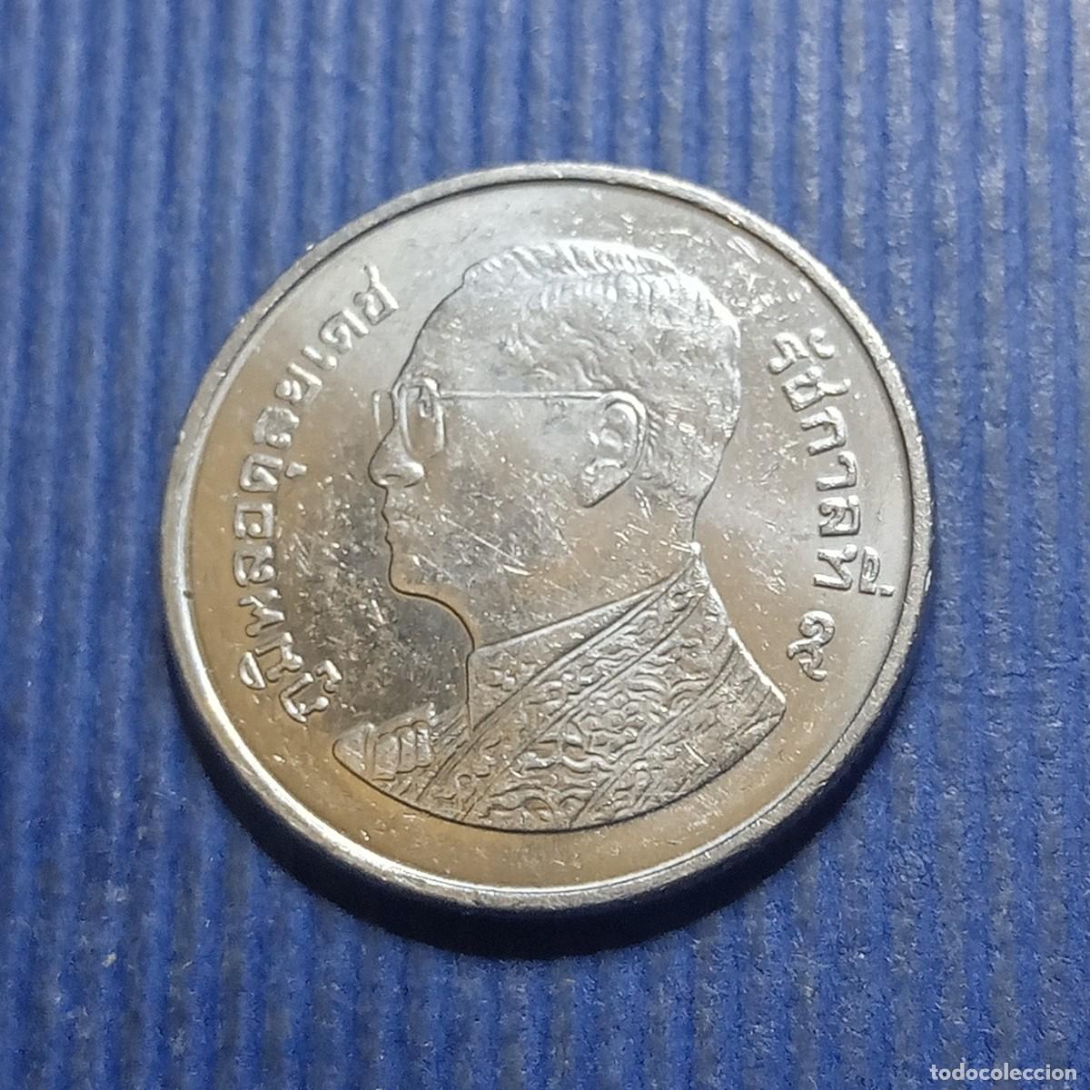 moneda 1 urn