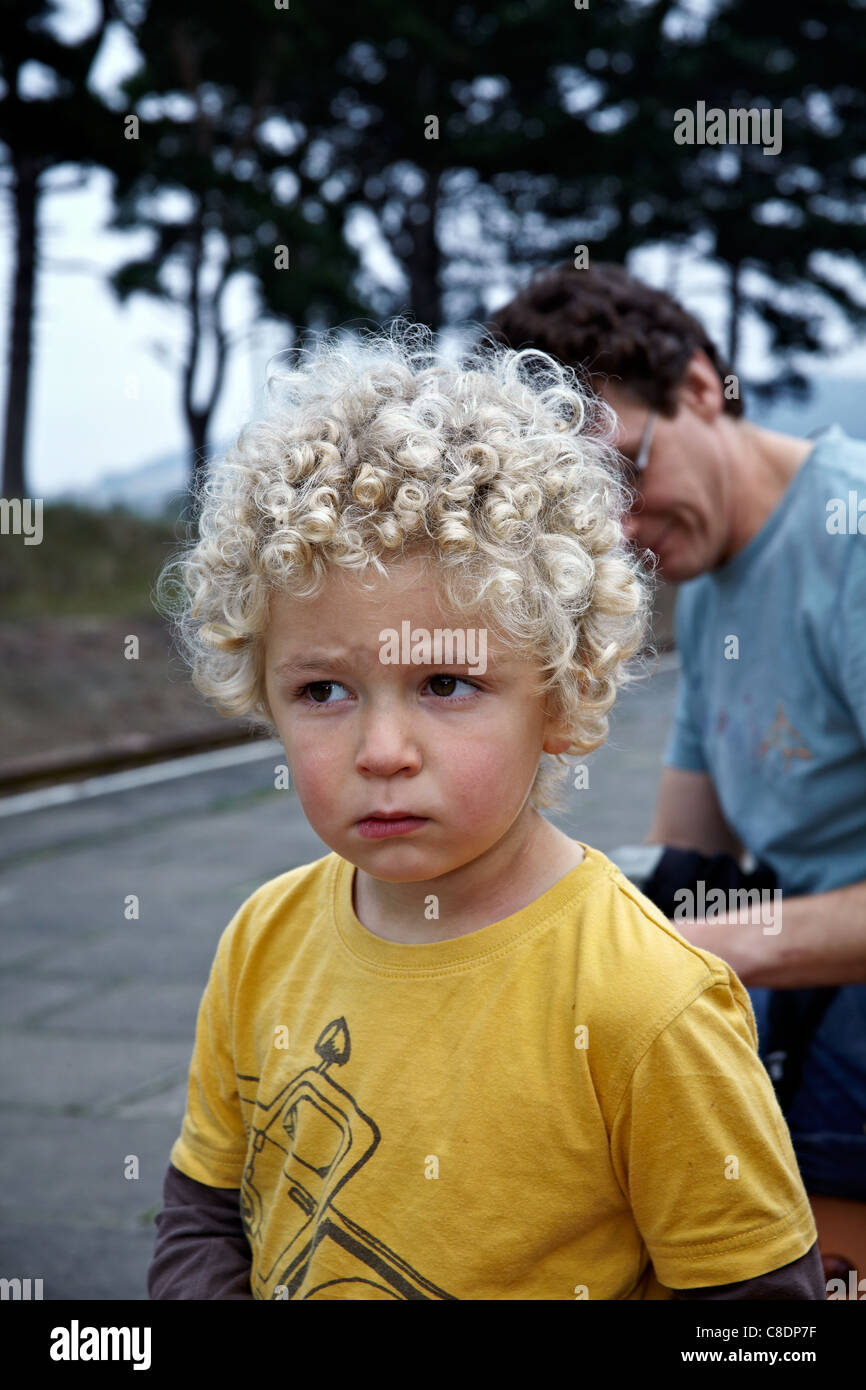 blonde curly hair boy