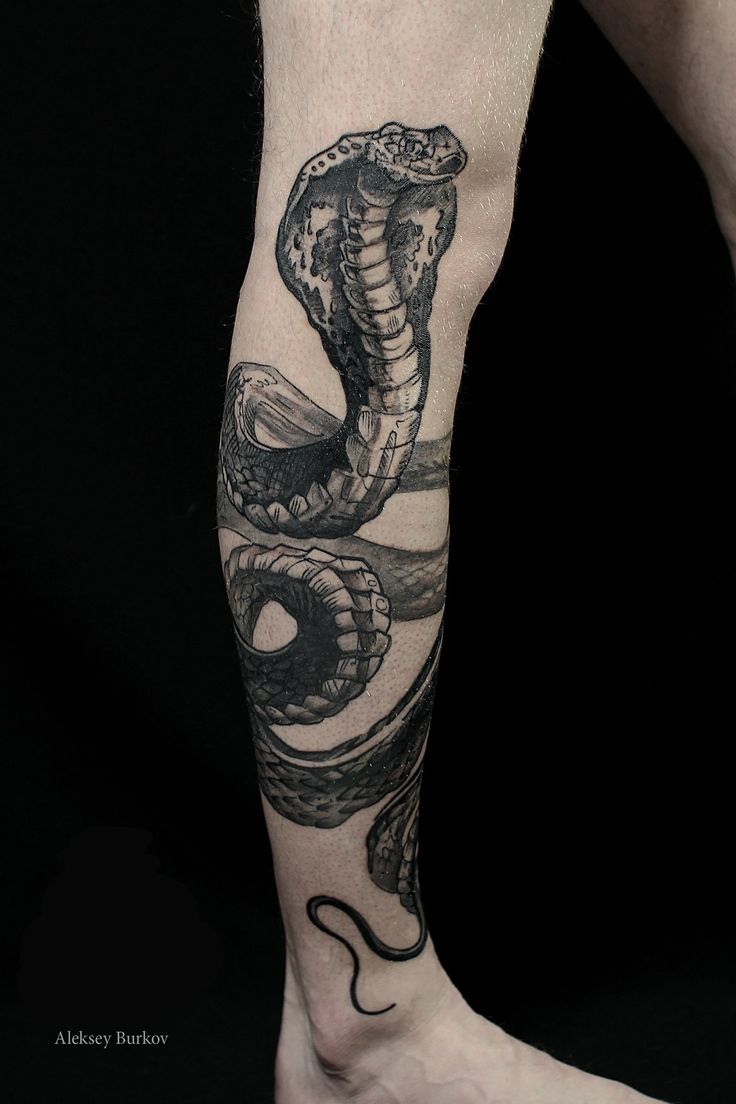 cobra tattoo on leg