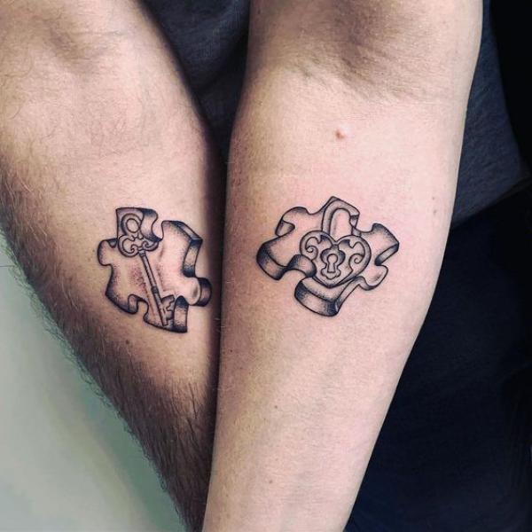 couples puzzle piece tattoo