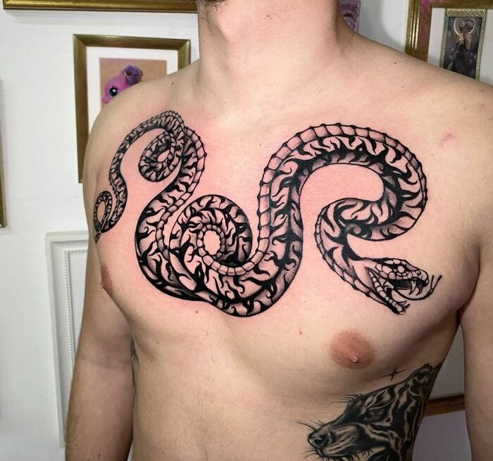 snake chest tattoo