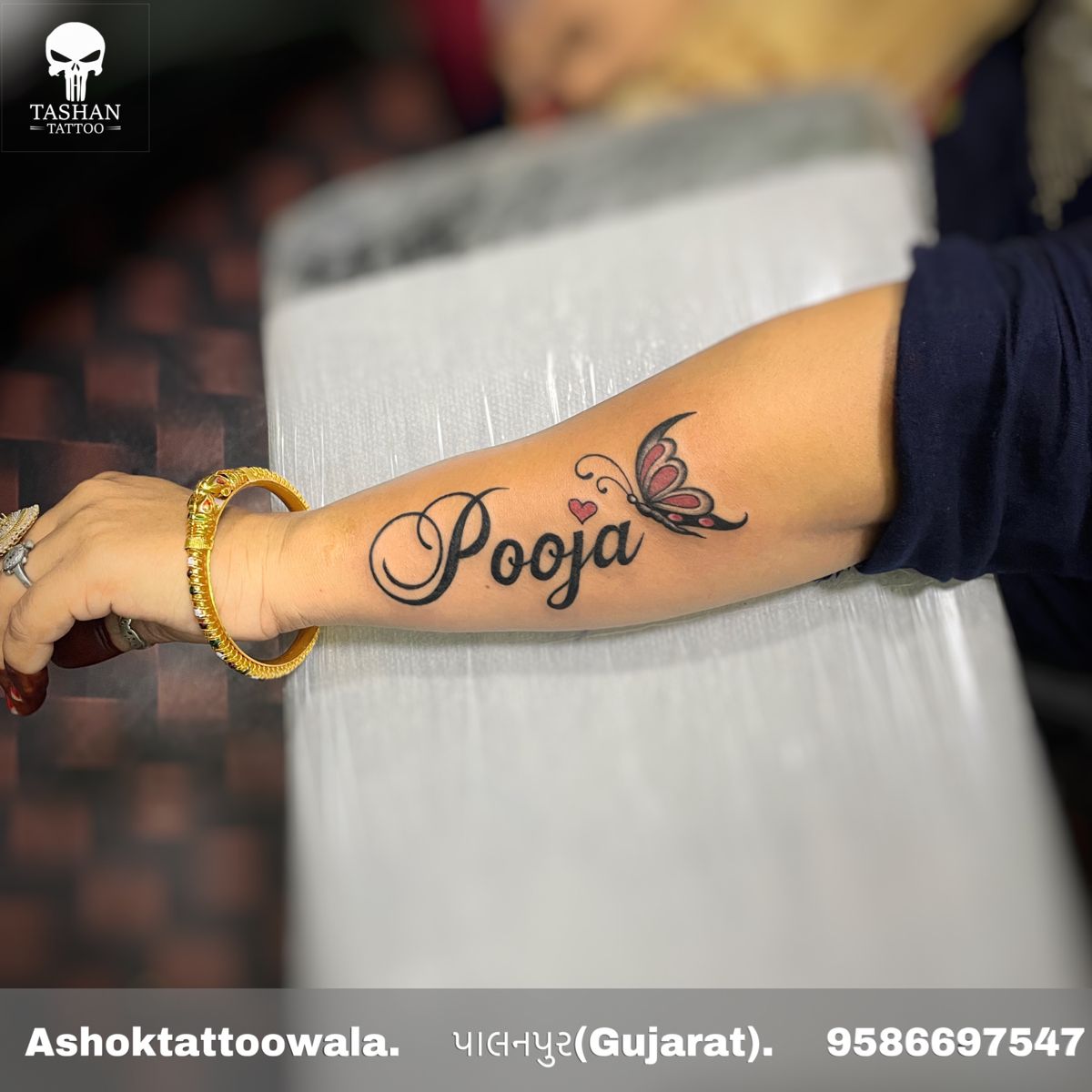 pooja name tattoo in hand