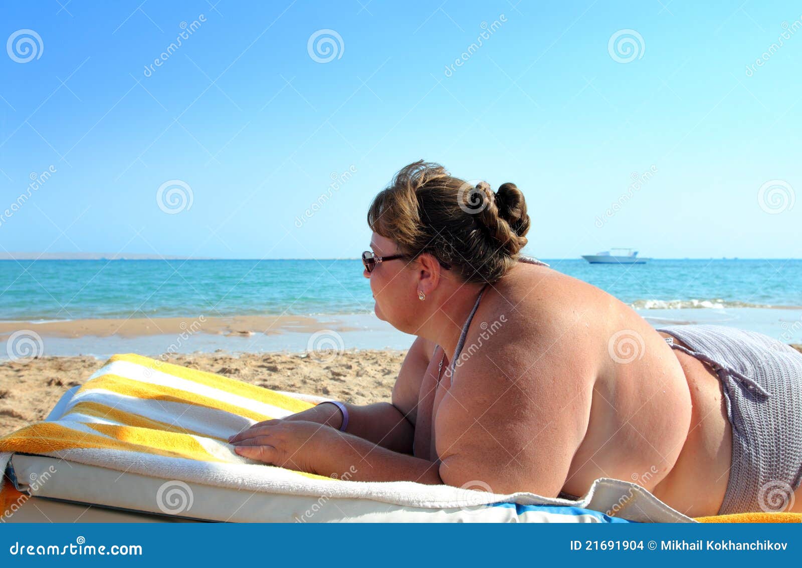 fat lady on a beach