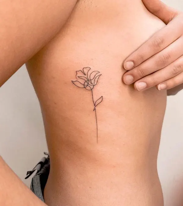 floral rib tattoo