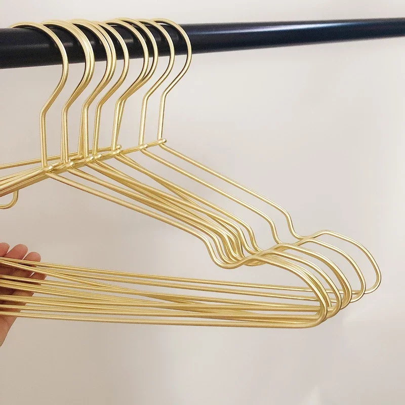 gold metal clothes hangers