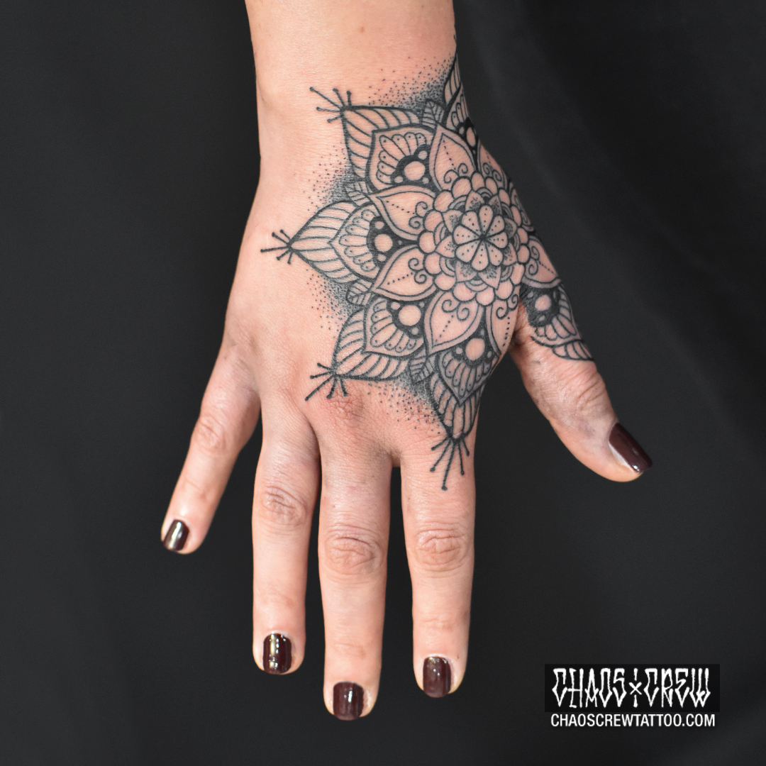 hand mandala tattoos