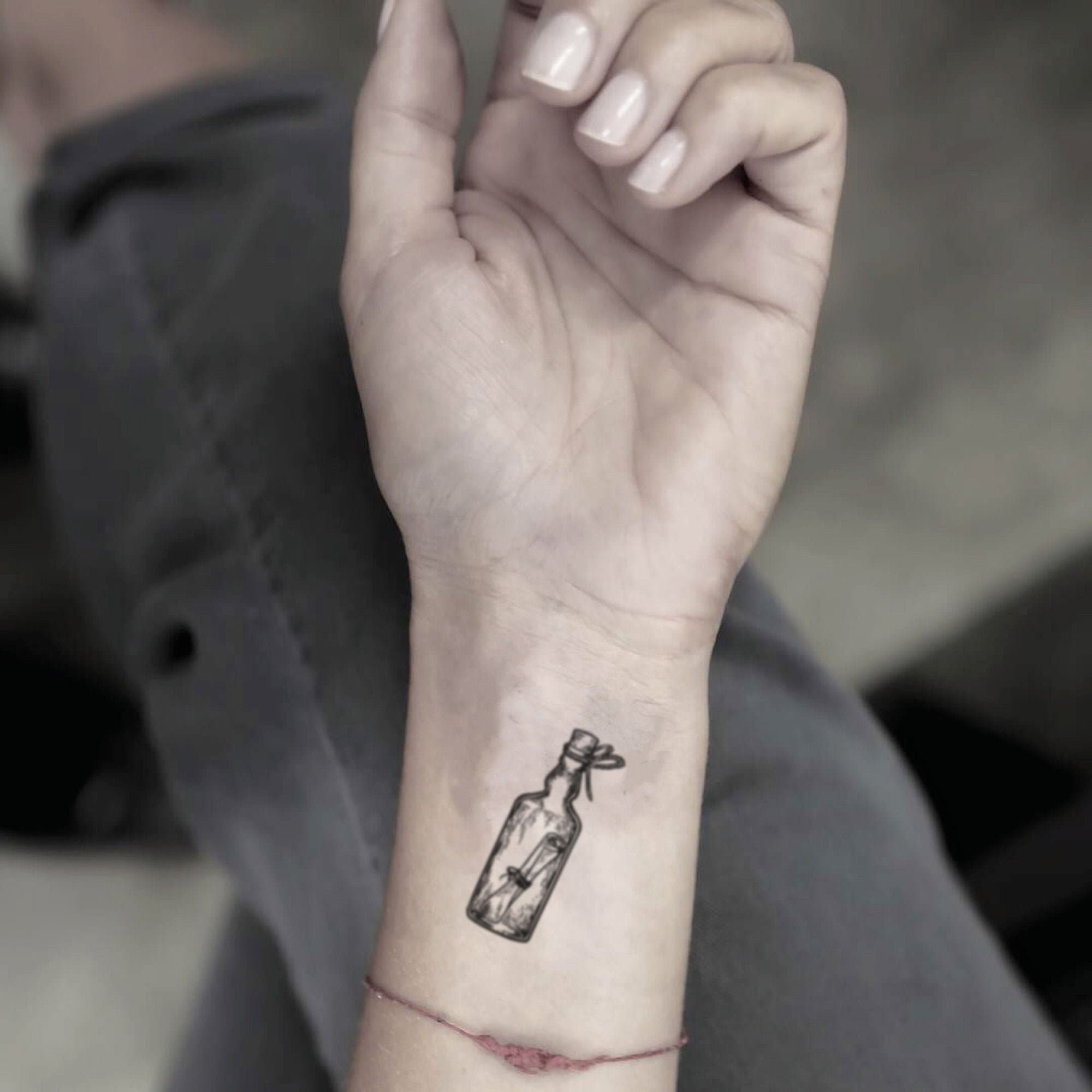 message in a bottle tattoo