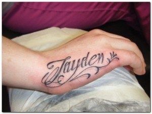 name tattoo hand