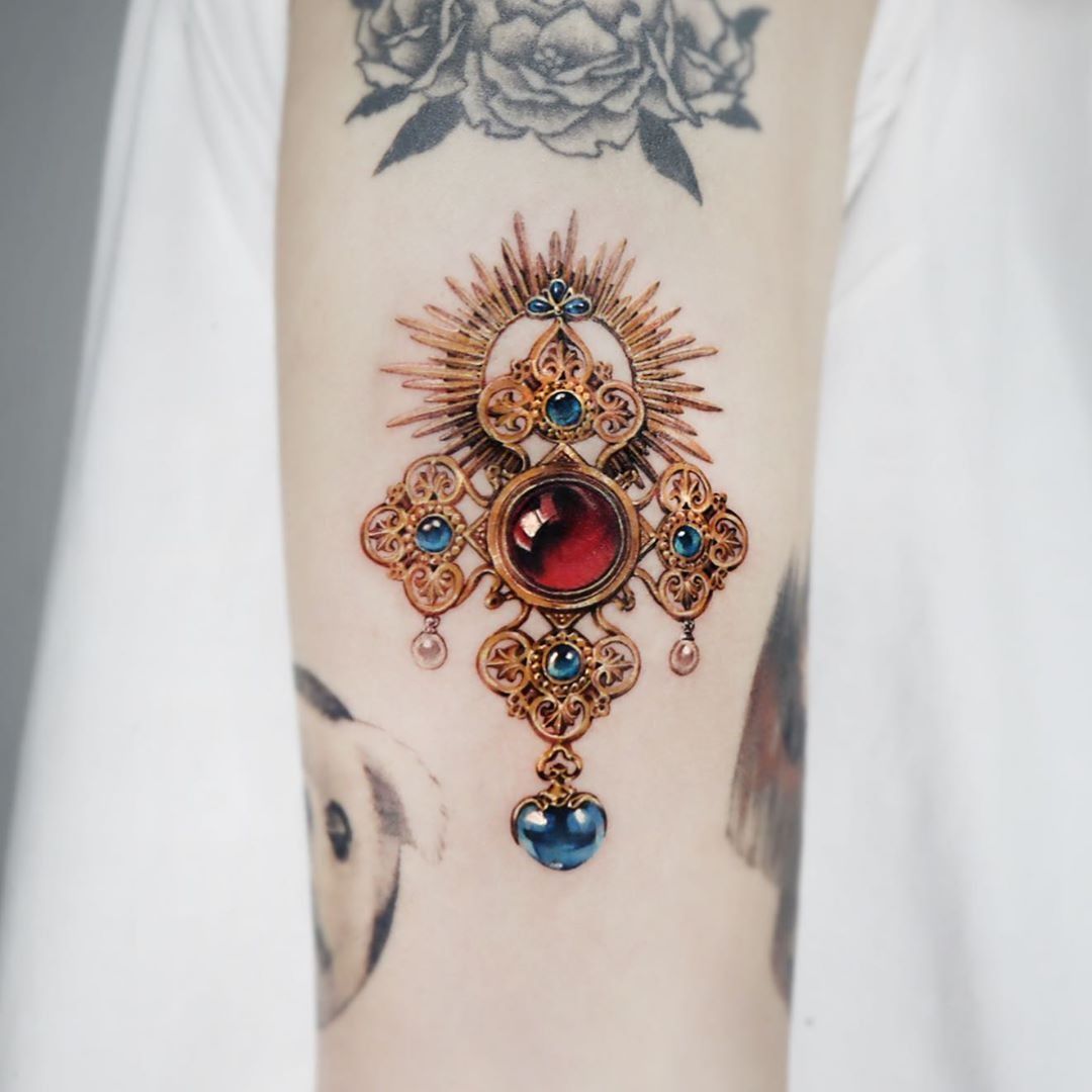 traditional gem tattoo